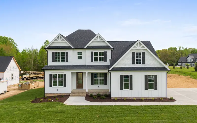 Contemporary suburban home with landscaped lawn, located in Youngsville, NC.